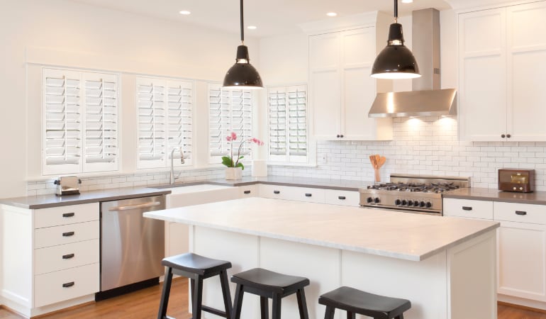 Plantation shutters in a bright Minneapolis kitchen.